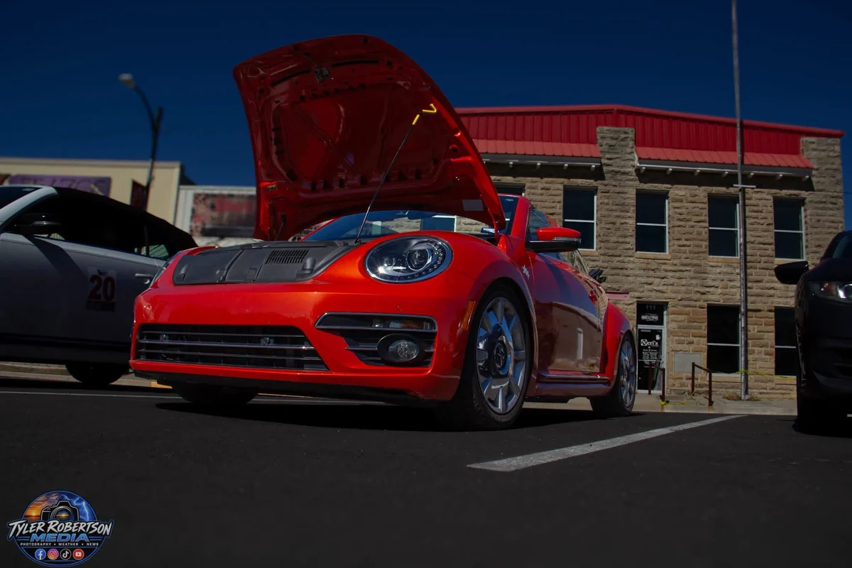 Orange Volkswagen Beetle on display at STOMP Fest 2026