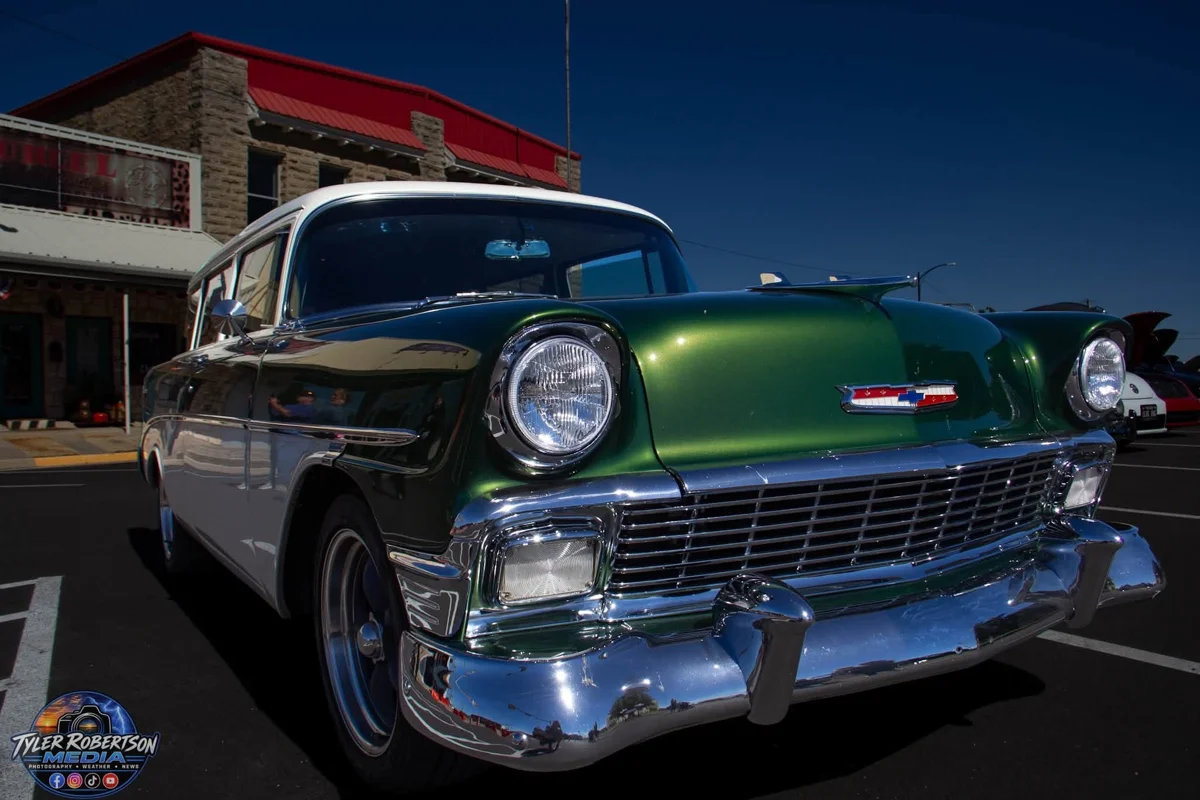 Front view of a green and white classic Chevrolet at STOMP Fest 2026