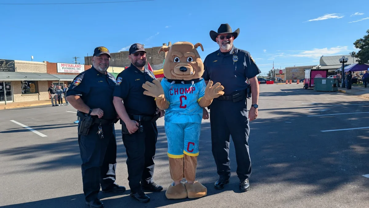Police officers with the CHOMP mascot at STOMP Fest 2026