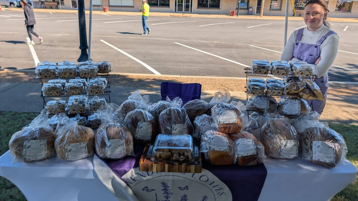 A vendor with a table of baked goods at STOMP Fest 2026