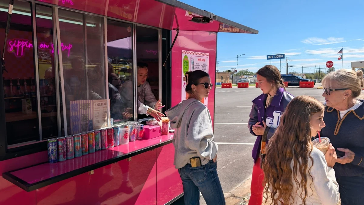 Customers visiting the pink drink truck at STOMP Fest 2026