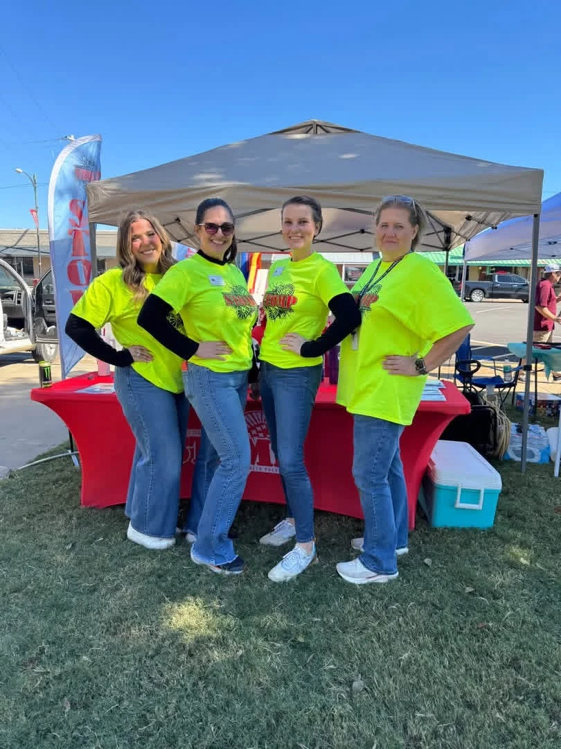 STOMP Fest 2026 team together at the event booth
